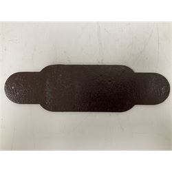 Cast iron Station Master wall plaque on a brown ground, L39cm