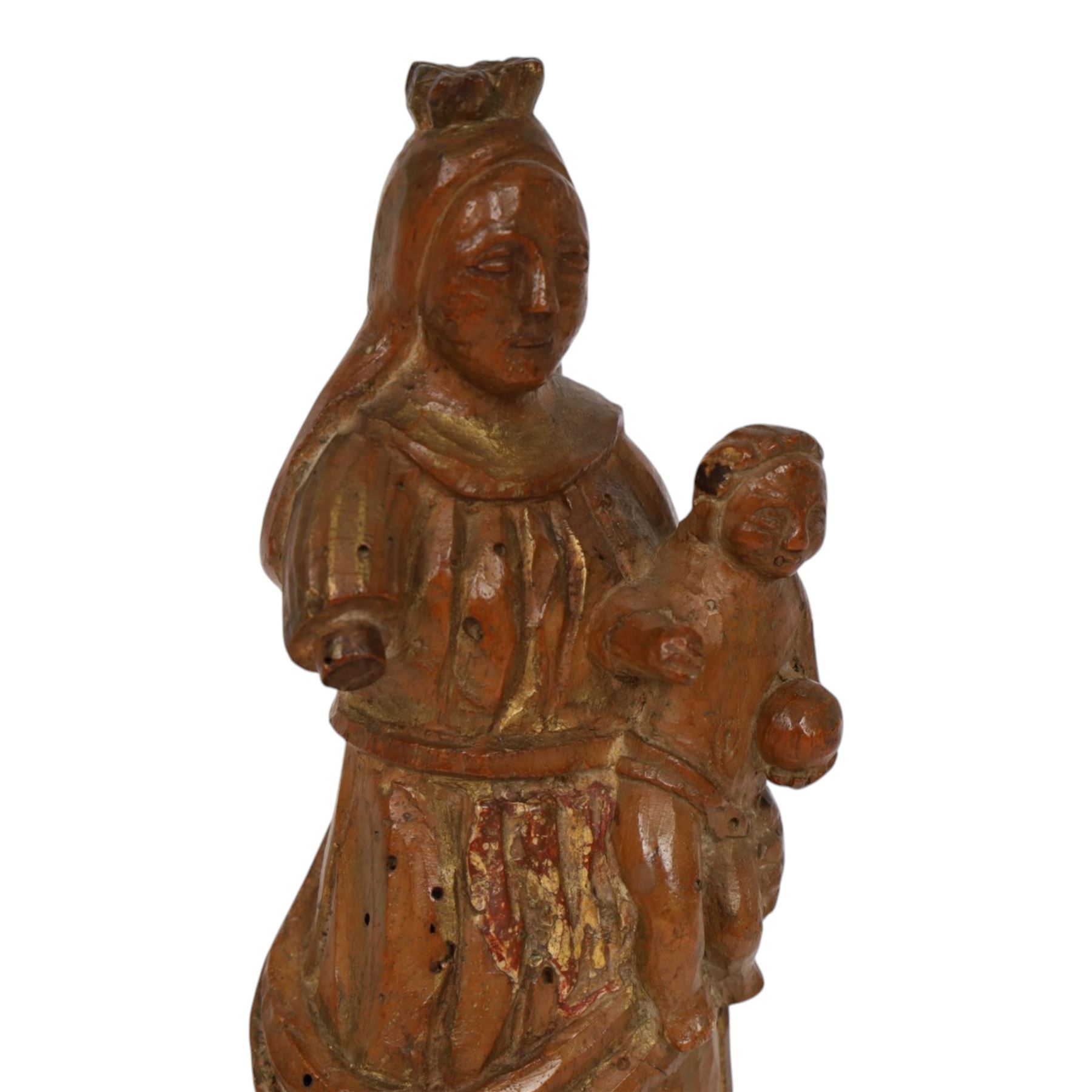 17th century carved limewood figure of a saint, with traces of original gilding, H22.5cm