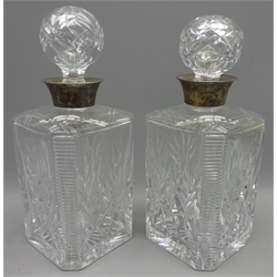  Pair of facet and fan cut square glass decanters with silver collars, hallmarked Birmingham 1957, H26cm (2)  