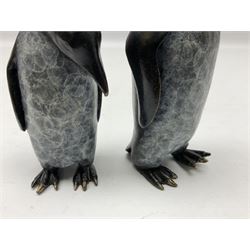 Steve Boss (British 1970-); Bronze figure group of a family of Emperor penguins, entitled Waddle, all with artists monogram beneath, tallest H12cm