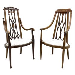 Two Edwardian inlaid mahogany bedroom chairs, with shaped and pierced splats, both upholstered in cream fabric depicting bird perched on branch and decorated with floral motifs