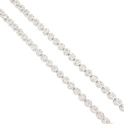 18ct gold diamond necklace, one hundred fourteen clusters, each set with seven round brilliant cut diamonds, hallmarked, total diamond weight 5.00 carat, boxed with certificate