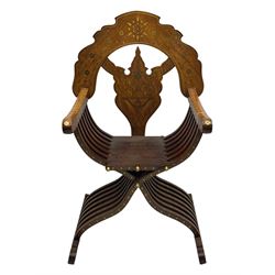 Late 20th century brass inlaid hardwood throne chair, curved X-frame form, raised shaped back inlaid with trailing leafy branches and flower heads, on sledge feet 