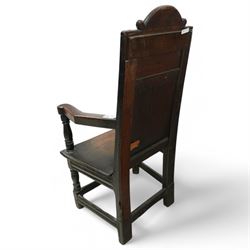 17th century and later carved oak Wainscot chair, the panelled back decorated with carved foliage and scrolls, the frame decorated with trailing guilloche and foliate motifs, moulded seat over turned supports united by stretchers 