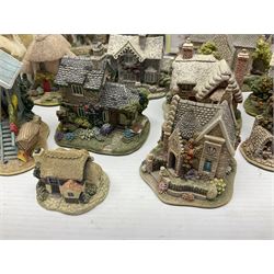 Twenty three Lilliput Lanes, including Village School, Lace's Shoe Shop, Cockles & Muscles, Scotland the Brave etc, together with The Leonardo Collection Paint Box Poppets and Gullivers World magazines 