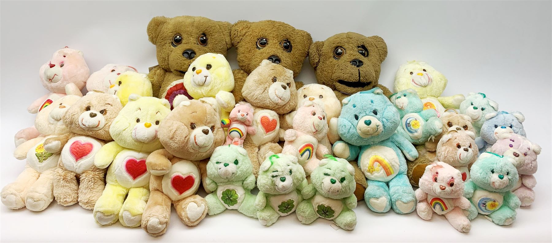 Three 'Nookie Bear' ventriloquist dummy bears with moving eyes and mouth H56cm; and twenty-five various size and colour 'Care Bears' (28)