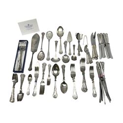  Silver Kings pattern knife, hallmarked Walker & Hall, together with a quantity of silver plated Kings pattern cutlery, including items by Osbourne's and United Cutlers, comprising table knives, table forks, table spoons, serving forks, ladle, berry spoons, teaspoons, dessert forks, cake slice, etc