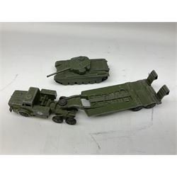 Dinky - twenty unboxed and playworn die-cast military vehicles including Mighty Antar tank Transporter No.660 with Centurion Tank No.651; Servicing Platform; Military Ambulance; Armoured Command Vehicle No.677; two 3-Ton Army Wagons No.621; Medium Artillery Tractor; Army Wagon No.623; Armoured Personnel carrier; Army water Tanker No.643; etc