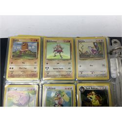 Collection of Pokemon trading cards, mostly 1999 Wizards Pokemon cards to include holo Charizard 4/102, first edition holo Machamp 8/102, further holographic cards; Dark Flareon 35/82 and Dark Vaporeon 45/82, cards from themed sets and 4th edition prints; 1998 Electronic Pokédex with cardboard boxes for themed decks Blackout, Overgrowth and Power Reserve Jungle, along with a large quantity of energy and trainer cards 