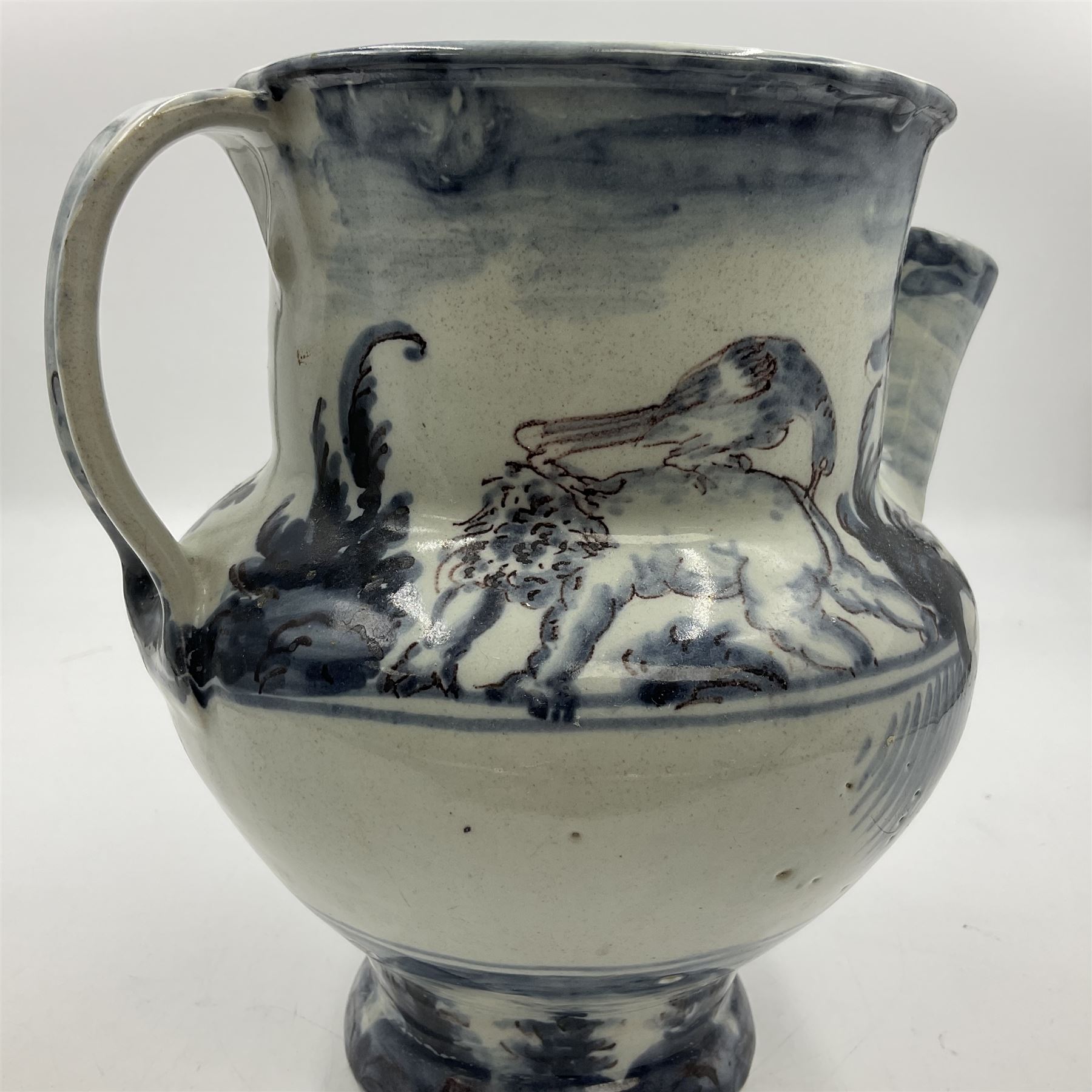 Tin glazed earthenware wet drug jug, decorated with cherubs in a landscape, H90cm 