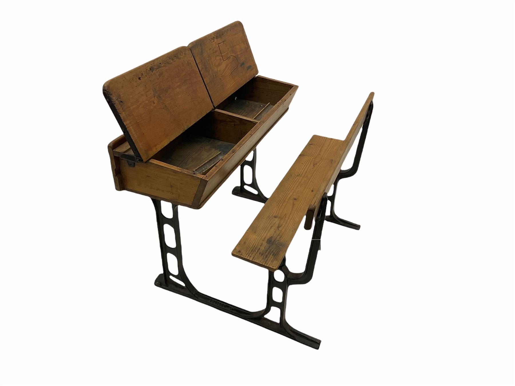 Early 20th century school desk, pine and cast iron, two sectional with hinged lids, the irons marked ‘Addision Ltd.’