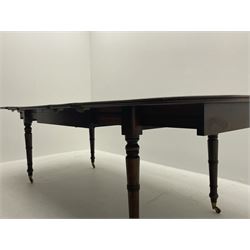 Early 19th century mahogany extending dining table, rounded rectangular top with moulded edge, pullout action base, on collar turned supports with brass cups and castors, three additional leaves
