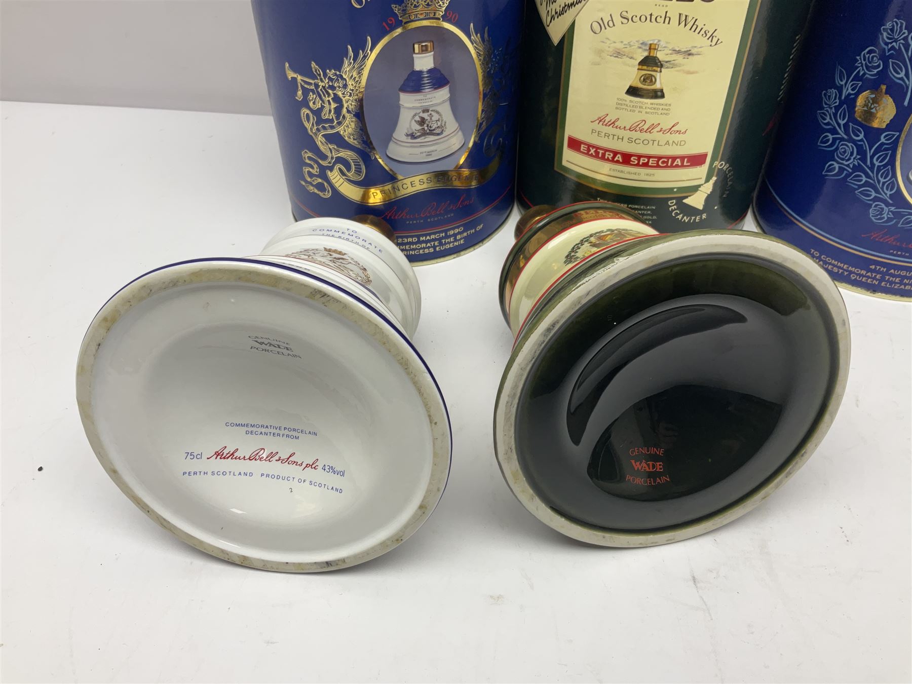 Bells, Scotch whisky, in seven Wade ceramic decanters, including Christmas 1988, 1989, 1990, 1991 etc