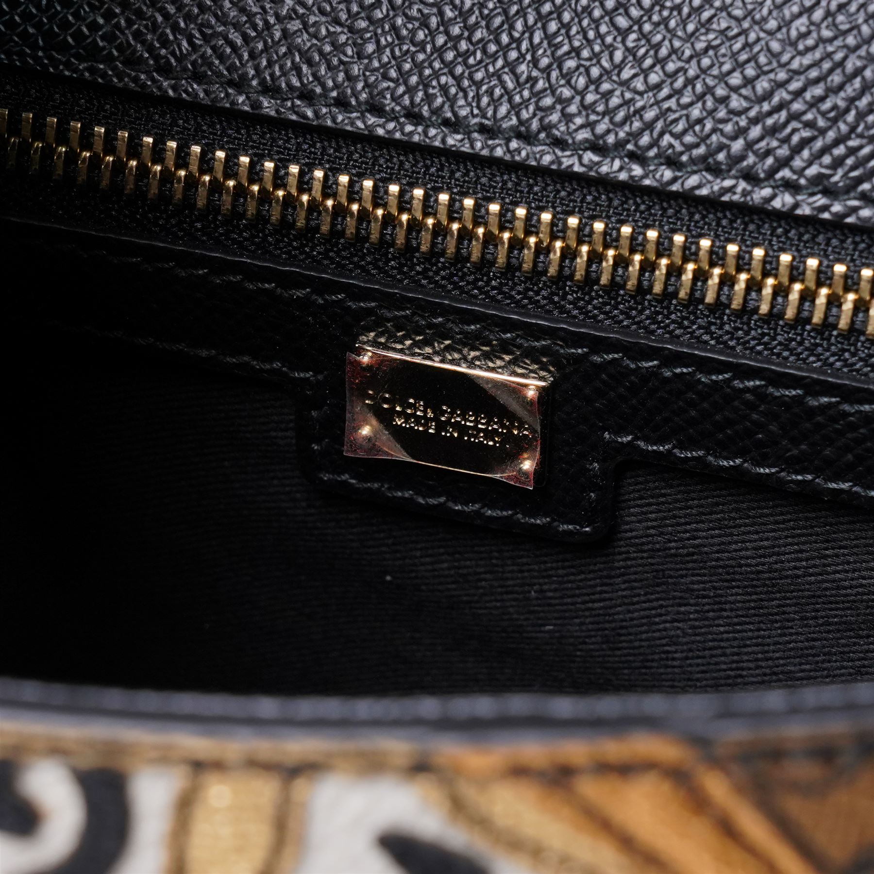 Dolce & Gabbana - 'Sicily Clock’ Medium Bag, from the Fairytale collection (Autumn/Winter 2016), in structured black textured leather, the front elaborately applied with a jewelled clock-face motif and floral embellishments, with top handle and detachable shoulder or crossbody strap, a limited production piece, unused with original box and dust bag