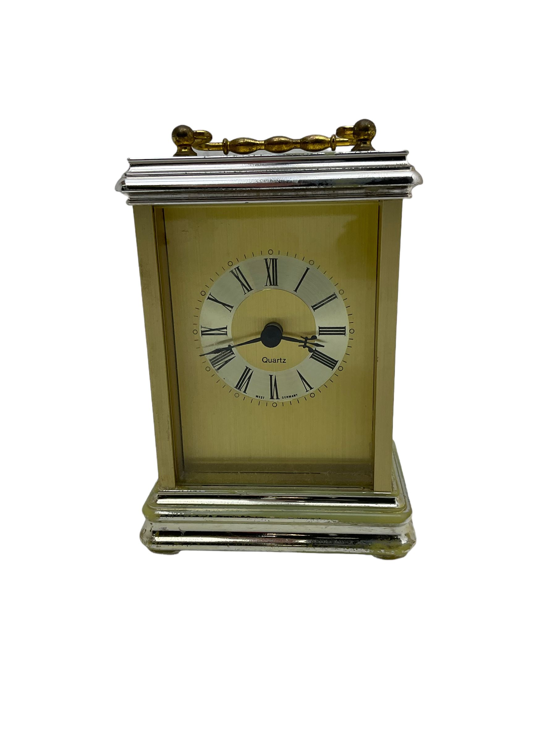 Three quartz mantle clocks and one 1930s mantle clock