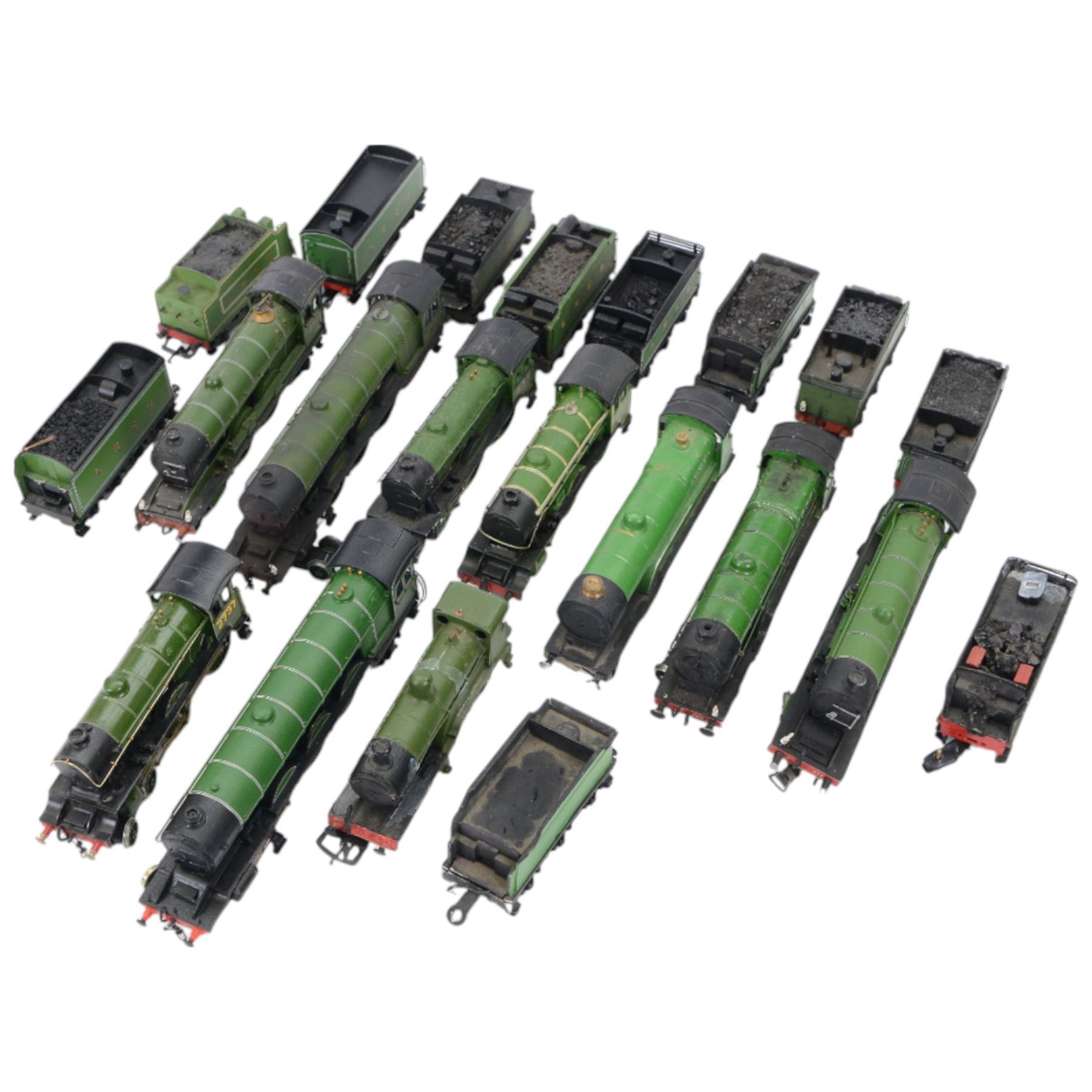 Ten 00 gauge kit built locomotives and eleven kit built tenders, all in green livery