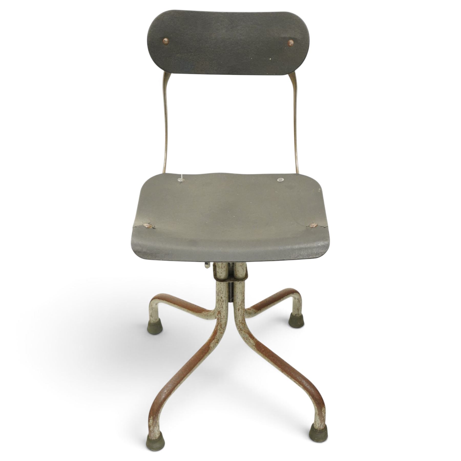 Pair of mid 20th century 'Tan-Sad' industrial chairs, black moulded fibre seats, raised on four supports