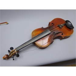 Early 20th century German violin with 36cm two-piece maple back and ribs and spruce top L58.5cm overall in ebonised wooden carrying case with two bows  