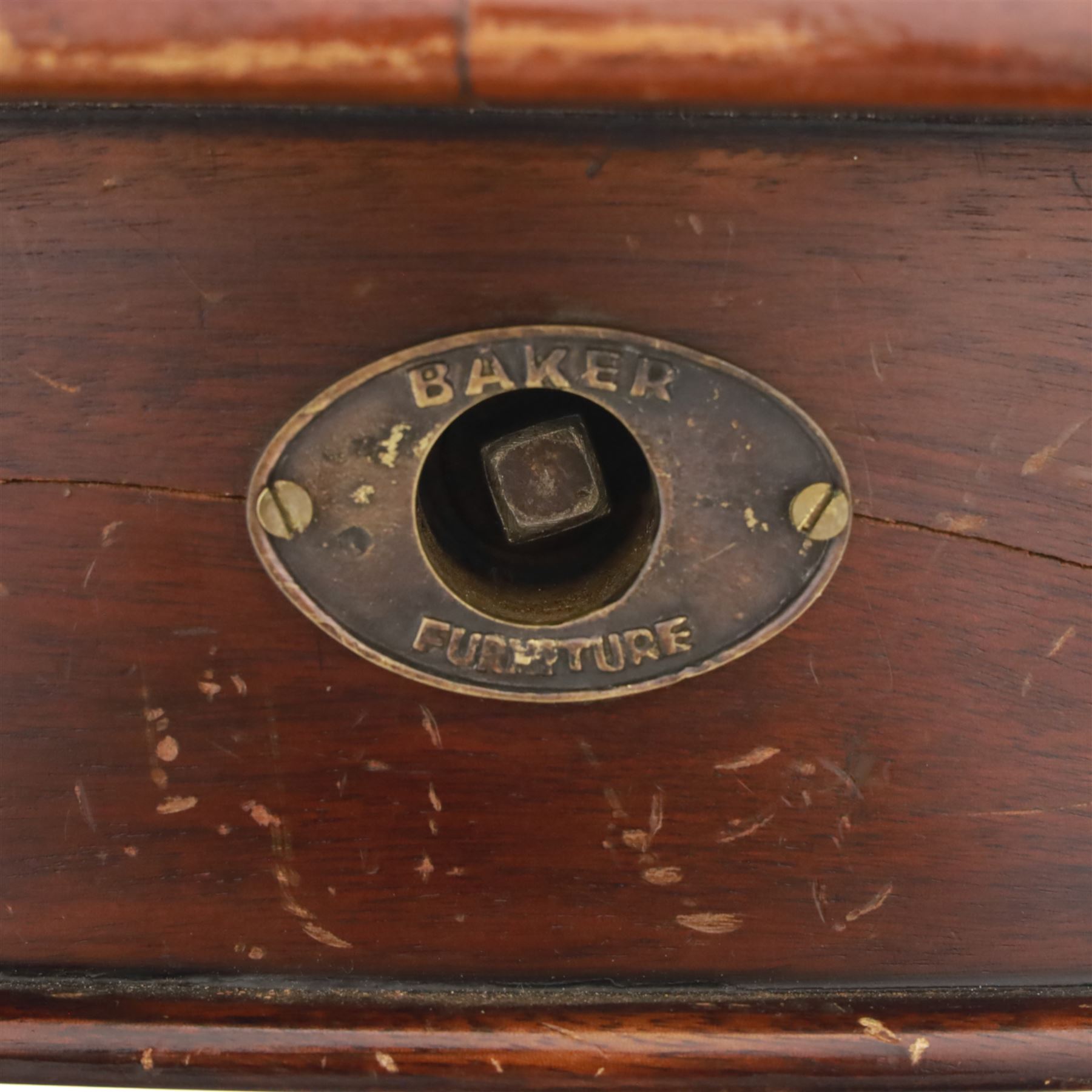 Victorian mahogany extending dining table, rounded rectangular top with moulded edge, pull-out action fitted with two additional leaves, raised on four reeded and fluted baluster legs with brass caps and castors