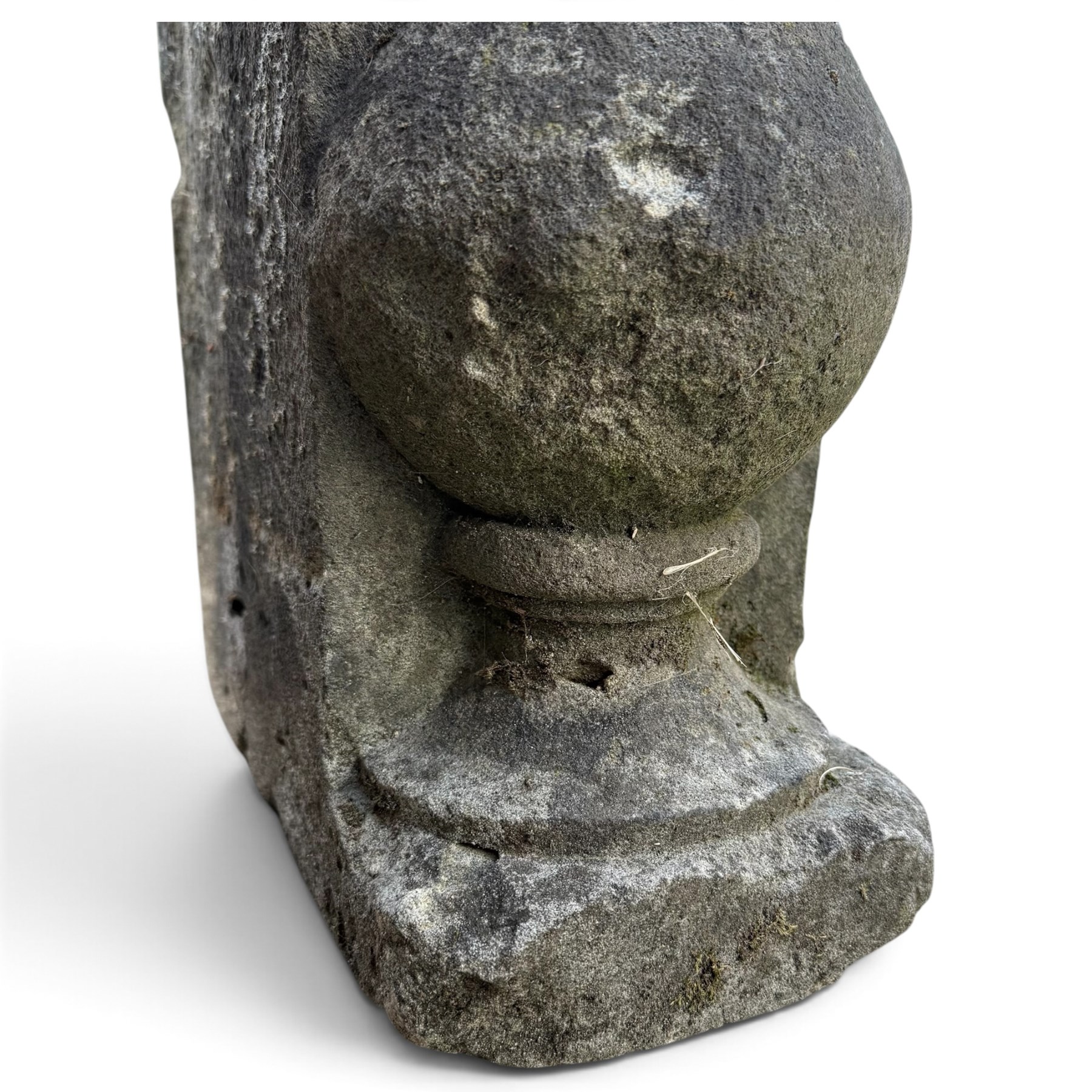 Pair of George III weathered carved sandstone architectural corbels, each with a projecting moulded capital above a half-canted baluster, waisted socle and stepped base