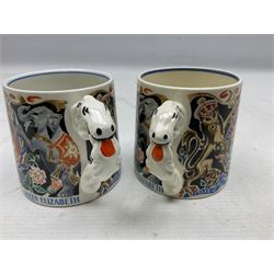 Two Dame Laura Knight coronation mugs for King George VI and Queen Elizabeth, comprising a Burleigh Ware example and a J&G Meakin example, each with a lion moulded handle and printed marks beneath, H8cm