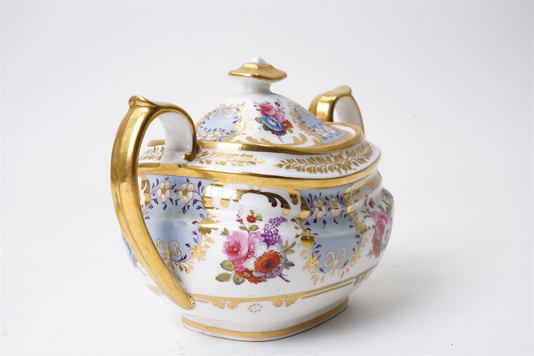 Brown-Westhead, Moore & Co cabinet cup and saucer, with rope twist moulded handle, hand-painted with floral reserves against a white and sky blue ground, heightened profusely with gilt, together with a pink hand-painted example, and a 19th century spill vase and twin-handled covered sucrier (4)