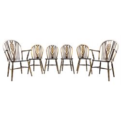 Set six (4+2) stained beech wheel and hoop back dining chairs, turned supports joined by stretchers 