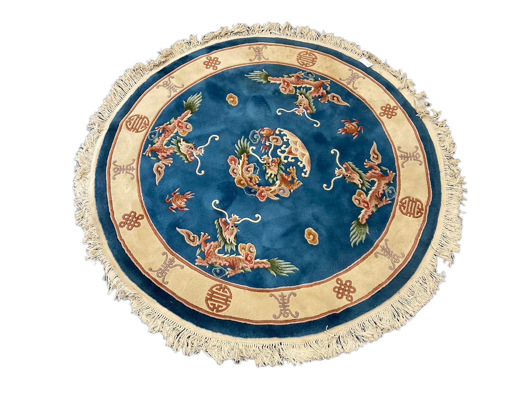 Three Chinese washed woollen rugs - circular blue ground decorated with dragons (D160cm), rectangular light green rug (185cm x 123cm), and a rectangular green rug (185cm x 123cm)