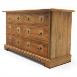 Barker & Stonehouse - 'Flagstone' chest of drawers, rectangular top made of solid mango wood with stone travertine inserts, above six short drawers applied with stone and metal ring pulls with star detail, raised on a shaped bracket base