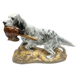 Royal Doulton model of an English setter carrying a pheasant, HN 2529, designed by Frederick Daws, H21cm