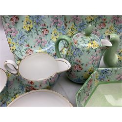 Shelley Melody pattern tea service for six, to include teapot, teapot stand, hot water jug, milk jug, covered sucrier, teacups and saucers, cake plates etc (31)