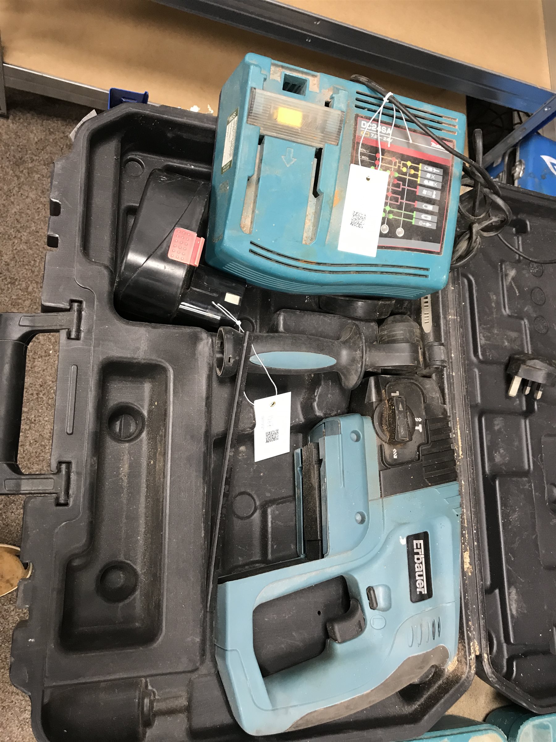 A quantity of hand tools including a Ferm FAG-230 angle grinder, a MacAllister reciprocating saw, a jig saw etc