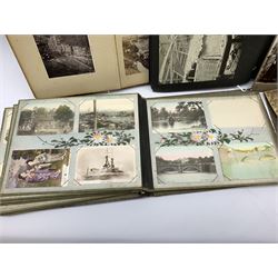 Early 20th century Japanese postcard album, the lacquered wooden covers with shibayama panel to the front, partially stocked with fifty Japanese postcards; Victorian album containing fifty-six laid-in photographs of British & Continental topographical scenes; mid-20th century album of Norwegian photographs; and quantity of Victorian cabinet photographs etc