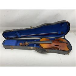 Czechoslovakian violin c1920 with 36cm two-piece maple back and ribs and spruce top, bears label 'Copy of Antonius Stradivarius Made in Czechoslovakia' L59cm; in carrying case; 1950s Czechoslovakian violin; and 195os Czechoslovakian three-quarter size violin; both cased (3)