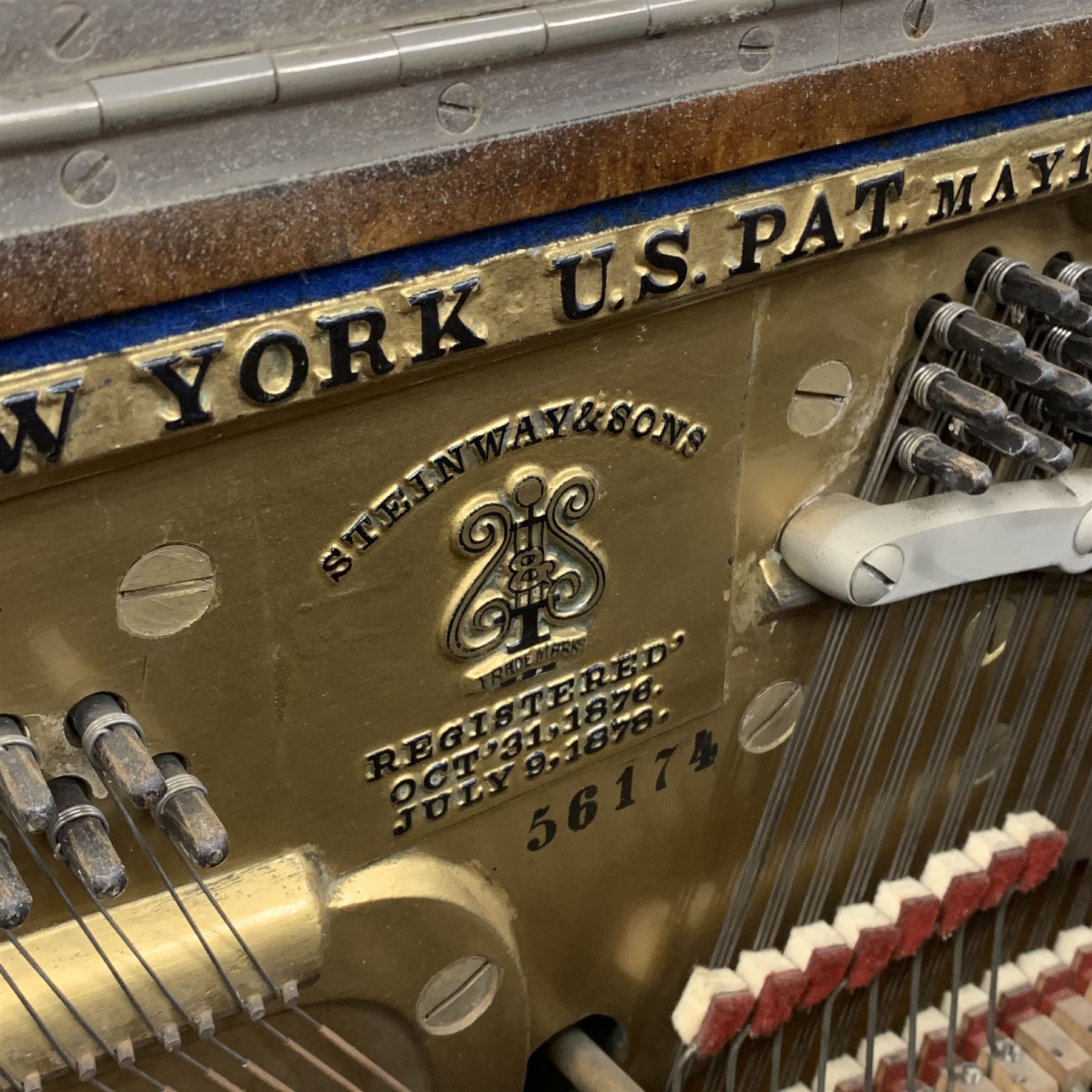 Steinway & Sons - late 19th century figured walnut upright piano, iron framed and overstrung, model no. 56174 circa. 1886, W154cm, H137cm, D70cm, together with a quantity of sheet music