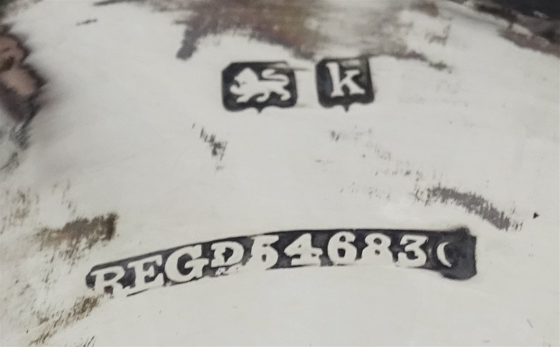 Edwardian silver three branch epergne by Cohen & Charles, Birmingham 1909 and two other silver specimen vases by Sydney & Co, Birmingham 1915