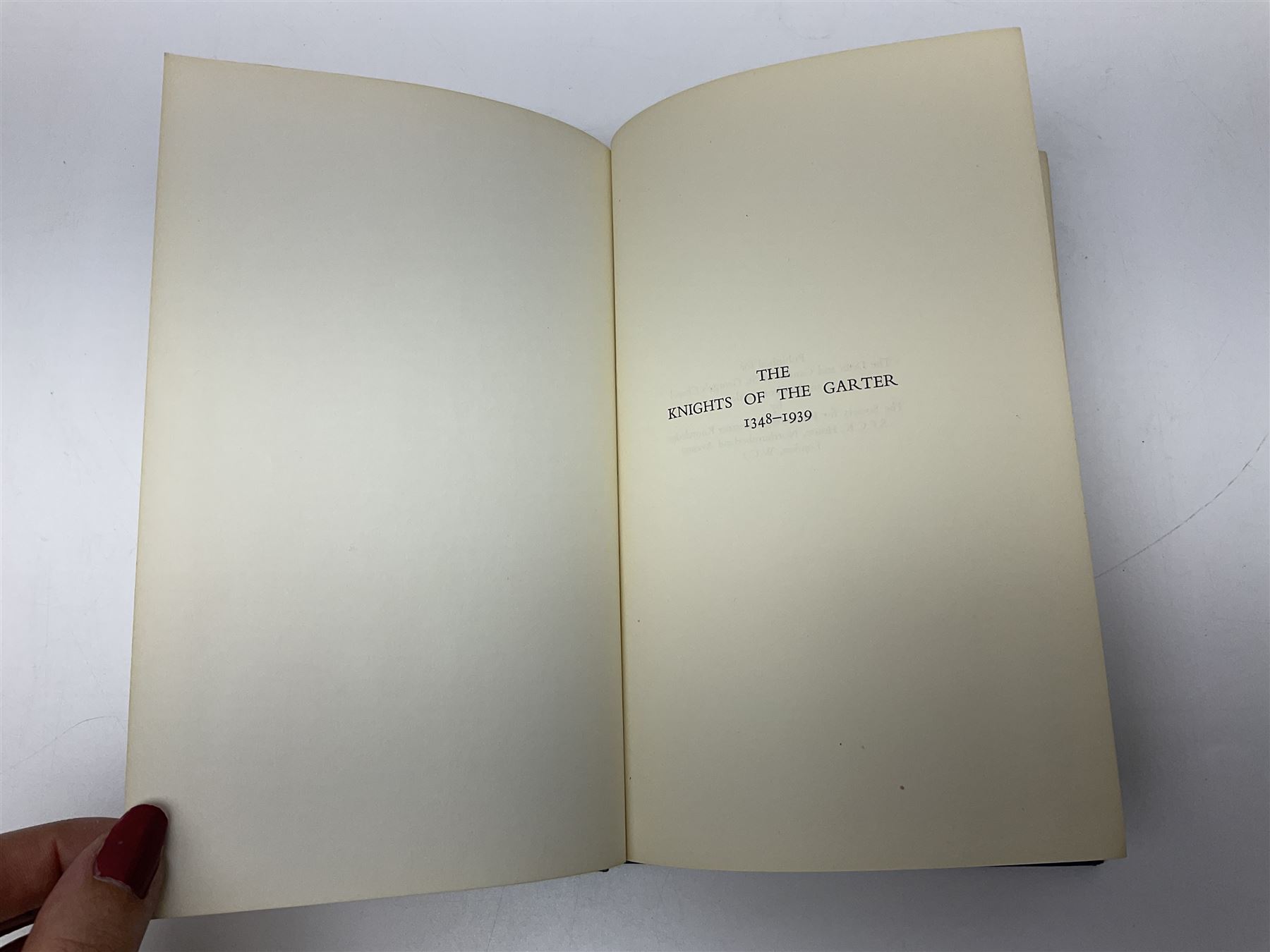 George VI Knight of the Garter cloth beret insignia with pin back and photograph of the Knight's Robes; Edmund Fellowes book on The Knights of the Garter 1348-1939; together with EIIR civilian OBE certificate to Jeffery Stanford Agate with facsimile signatures of Elizabeth II and Prince Philip