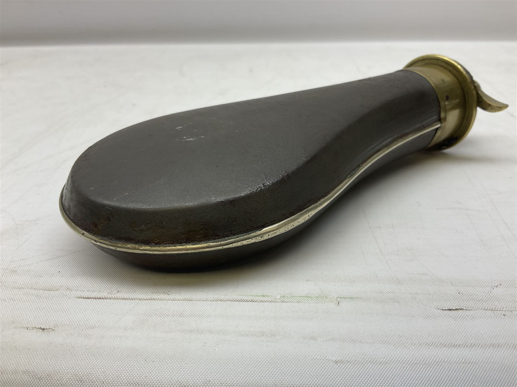 Two Sykes Patent brass mounted small load powder flasks with fire proof safety tops - one with slim plain copper body H17.5cm; the other with plain gun metal body H19cm (2)