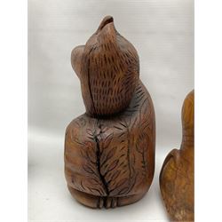 Helen Skelton (British 1933 – 2023): Three carved wooden abstract sculptures, each modelled as a cat, with carved or painted features, largest H63cm. Born into an RAF family in 1933 in Kent and travelled the world extensively during her childhood. After settling in Bridlington, Helen immersed herself in painting, textiles, and wood sculpture, often inspired by nature's beauty. Her talent was showcased in a one-woman show at Sewerby Hall and recognised with the sculpture prize at Ferens Art Gallery in 2000. Sadly, Helen’s daughter passed away from cancer in 2005. This loss inspired Helen to donate her sculptures to Marie Curie upon her passing in 2023.