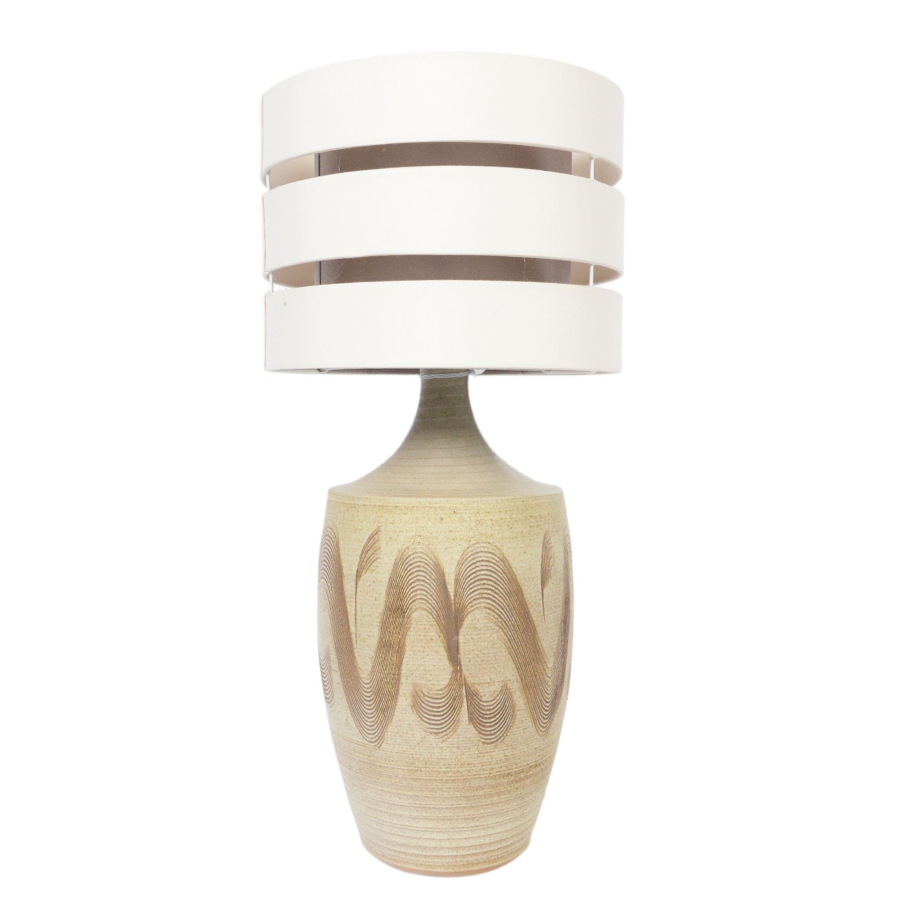 David White pottery lamp, of baluster form with elongated neck, with a brown spiral pattern on a cream ground, without shade H52cm