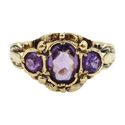 Gold amethyst pendant, stamped 18K, on 9ct gold chain necklace and a 9ct gold three stone amethyst ring, hallmarked