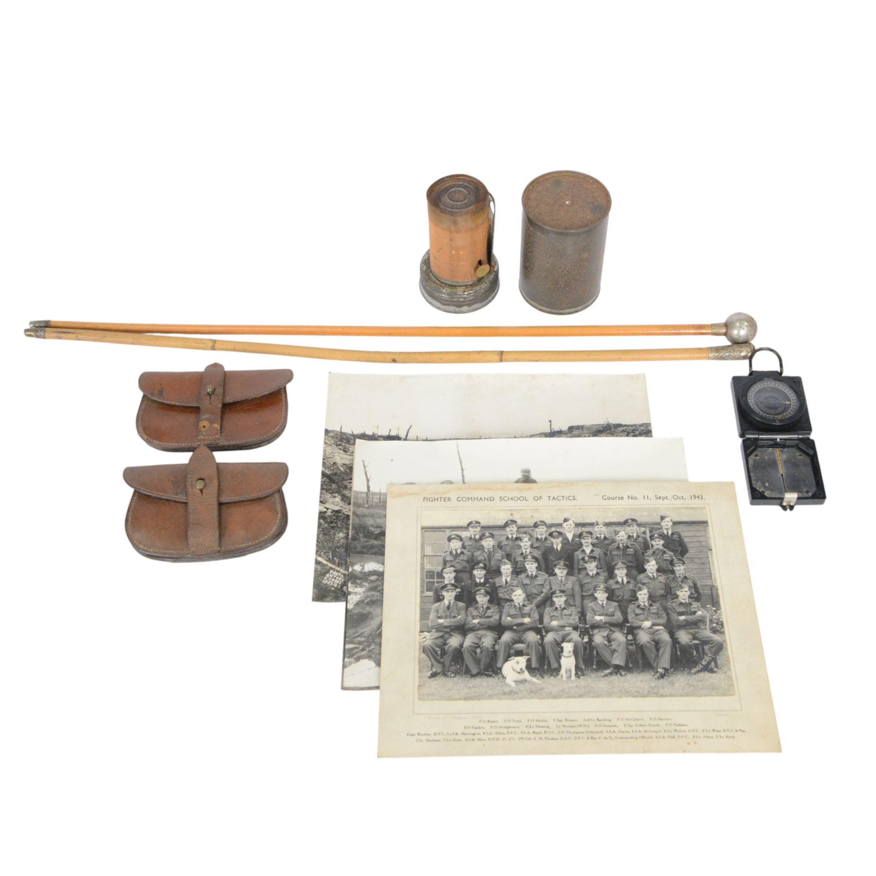 WWII British army fuel heater, the covered marked 1943 13 MB, together with Mark I military issued compass, together with two WWI leather belt cases, two swagger sticks and military ephemera   