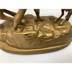 Pair of spelter mantel figural group sculptures of rearing horses and handlers on oval bases, H44cm