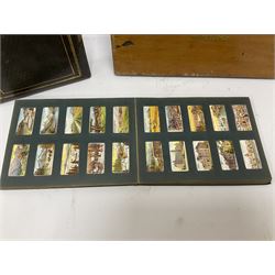 No 2 model Ellams Duplicator Ban Tam, together with a leather bound photo album and a 'Wills's cigarette card Album' full of cigarette cards