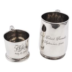 Early 20th century silver christening mug, of tapering cylindrical form, with C handle and personal engraving to centre, upon stepped base, hallmarked Chester 1913, maker's mark worn and indistinct, together with a Victorian silver christening mug, of slightly tapering form, with C handle, later personal engraving to centre and beaded rim to base, hallmarked James Dixon & Sons Ltd, Sheffield 1880, tallest H9cm