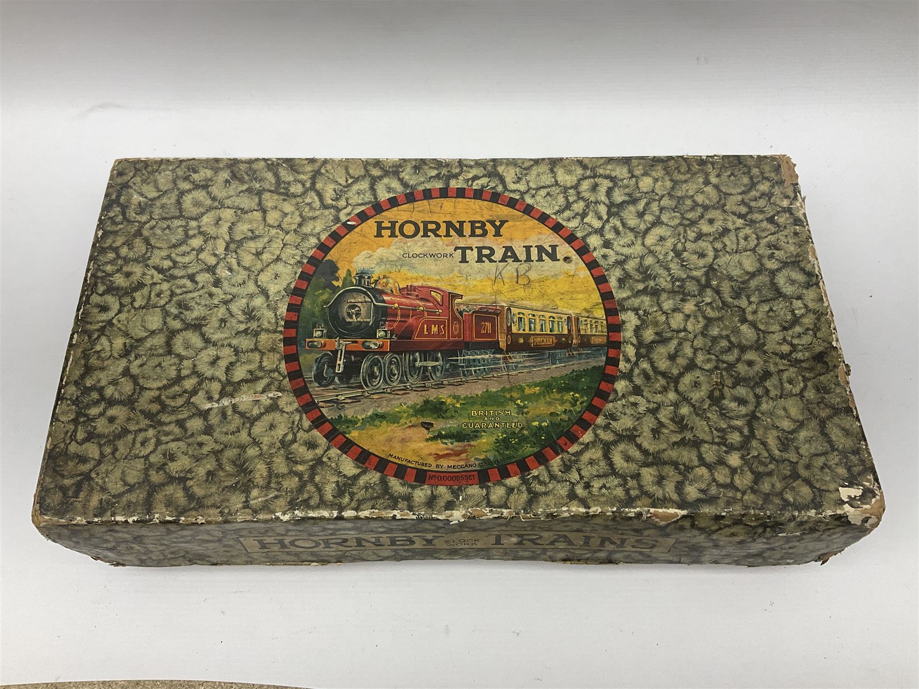 Hornby ‘0’ gauge - No. 0 Goods Set box containing clockwork LNER 0-4-0 locomotive with matching tender no.2710 in black and gold, originally from the No. 1 Goods Set; with NE open wagon, quantity of track, track clips, buffer and key 