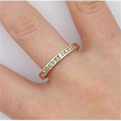 Gold channel set diamond half eternity ring, stamped 10K