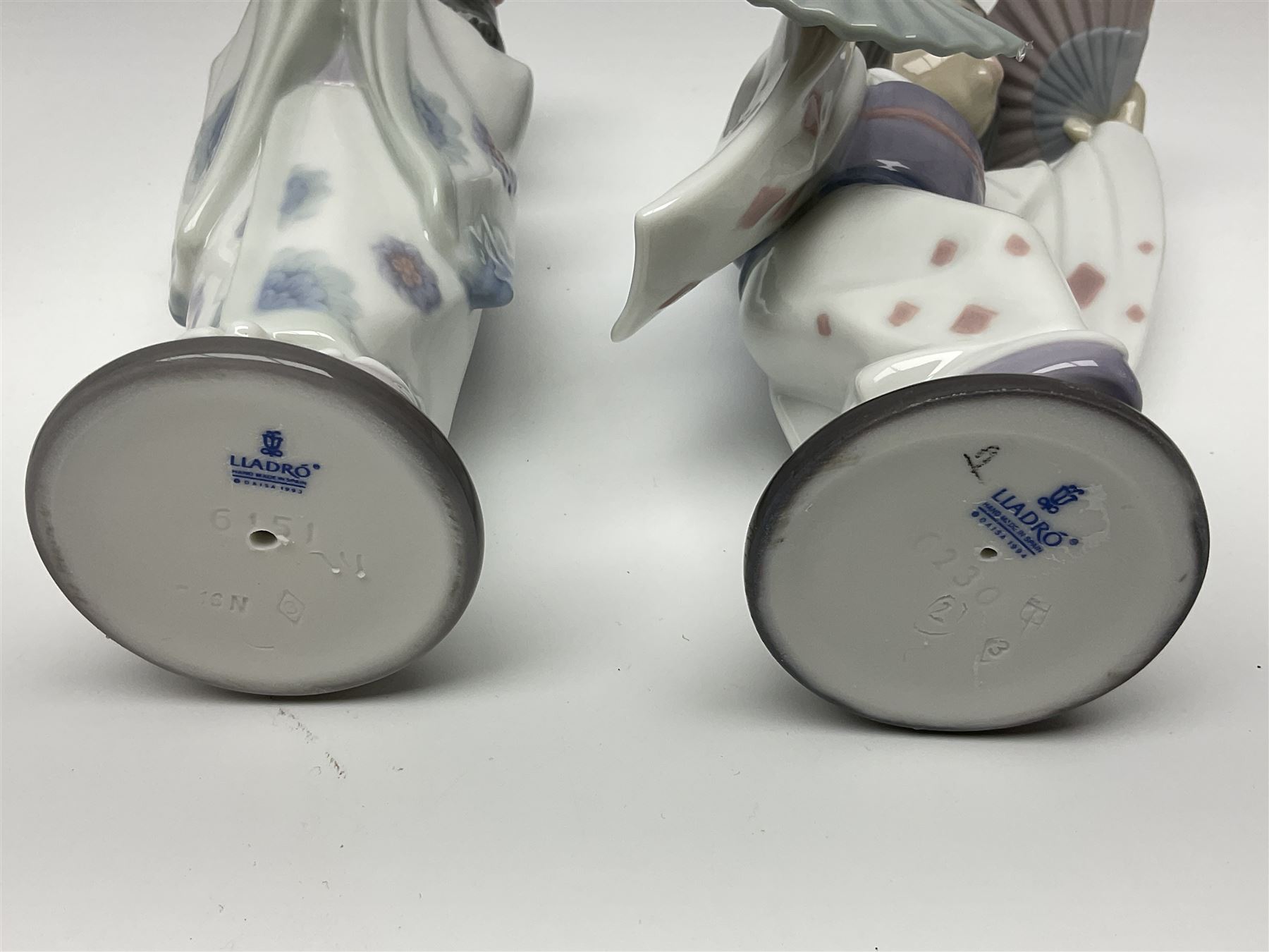 Six Lladro figures of the China doll set and Oriental doll set, comprising Playing the Flute no.6150, Bearing Flowers no.6151, Flower Gazer no. 6152, Oriental Dance no. 6230, Oriental Lantern no. 6231 and Oriental Beauty no. 6232, largest H20cm