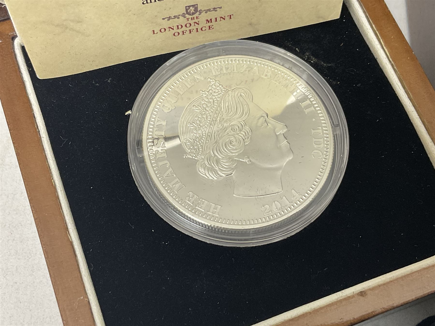 Commemorative Tristan Da Cunha coins including 2013 'The 60th Anniversary of the Coronation of Queen Elizabeth II Pure Silver Crown Set' cased with certificate,  2014 'World War I Silver Commemorative' one crown cased with certificate, 9ct gold 2012 half crown approximately 1 gram etc