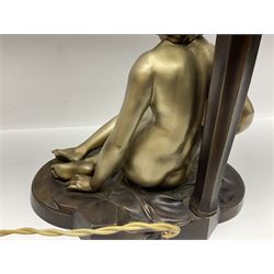 Art Deco style bronzed and gilded spelter figural table lamp with green Uranium glass shade; H48cm, another table lamp; and a bisque group